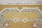 Luisa is a Swedish röllakan rug by textile designer Karin Jonsson. This unique rug features a beautiful ochre yellow colour palette and a geometric design