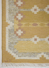 Luisa is a Swedish röllakan rug by textile designer Karin Jonsson. This unique rug features a beautiful ochre yellow colour palette and a geometric design