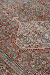 Tallulah is an antique Mahal rug. This carpet features an incredible palette of soft terracotta, blues and greens and a stunning intricate design.