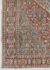 Tallulah is an antique Mahal rug. This carpet features an incredible palette of soft terracotta, blues and greens and a stunning intricate design.