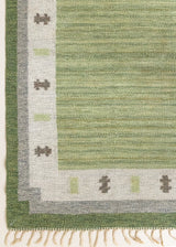 Lilo is an original vintage Swedish röllakan rug from around the 1960s, featuring wonderful palette of various shades of green and ecru tones and a beautifully simple design.