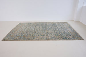This is a handmade antique Tabriz rug, woven in Persia. The Tabriz region is known for producing some of the most ornate Persian carpets, often known for their mesmerising and intricate repeating patterns.