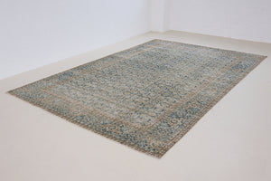 This is a handmade antique Tabriz rug, woven in Persia. The Tabriz region is known for producing some of the most ornate Persian carpets, often known for their mesmerising and intricate repeating patterns.