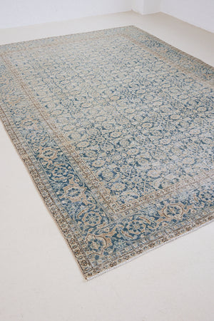 This is a handmade antique Tabriz rug, woven in Persia. The Tabriz region is known for producing some of the most ornate Persian carpets, often known for their mesmerising and intricate repeating patterns.