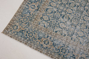 This is a handmade antique Tabriz rug, woven in Persia. The Tabriz region is known for producing some of the most ornate Persian carpets, often known for their mesmerising and intricate repeating patterns.