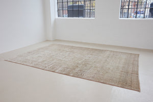 Cecil is a beautiful antique Persian Tabriz rug with a soft and subtle colour palette and in an extra large size. This pretty carpet features highly detailed flowers, palmettes, arabesques and leafy sprays throughout the field and borders, symbolising nature and beauty.