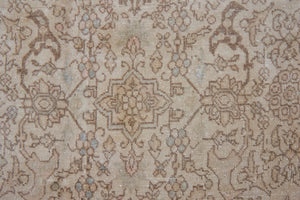 Cecil is a beautiful antique Persian Tabriz rug with a soft and subtle colour palette and in an extra large size. This pretty carpet features highly detailed flowers, palmettes, arabesques and leafy sprays throughout the field and borders, symbolising nature and beauty.
