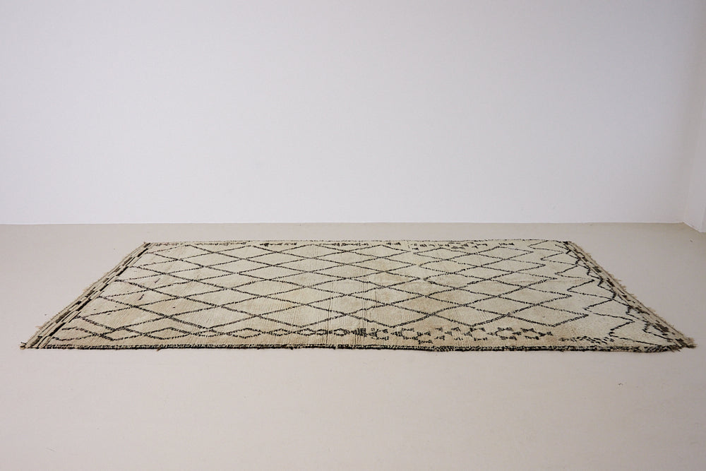 Indie is a vintage Beni Ourain carpet from the middle Atlas mountains located in Morocco. This is a unique rug and a real piece of history that would work well in any interior.
