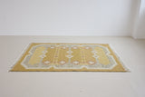 Luisa is a Swedish röllakan rug by textile designer Karin Jonsson. This unique rug features a beautiful ochre yellow colour palette and a geometric design