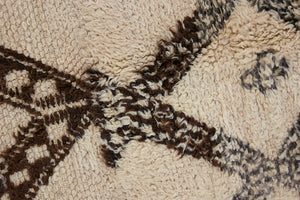 Remi is a vintage Beni Ourain carpet from the middle Atlas mountains in Morocco. Authentic Moroccan rugs are handwoven using a technique honed for decades and high grade natural wool. 