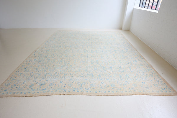 Annabelle is a beautiful Mahal rug featuring a peachy taupe field and a pretty, decorative all over floral design in blue
