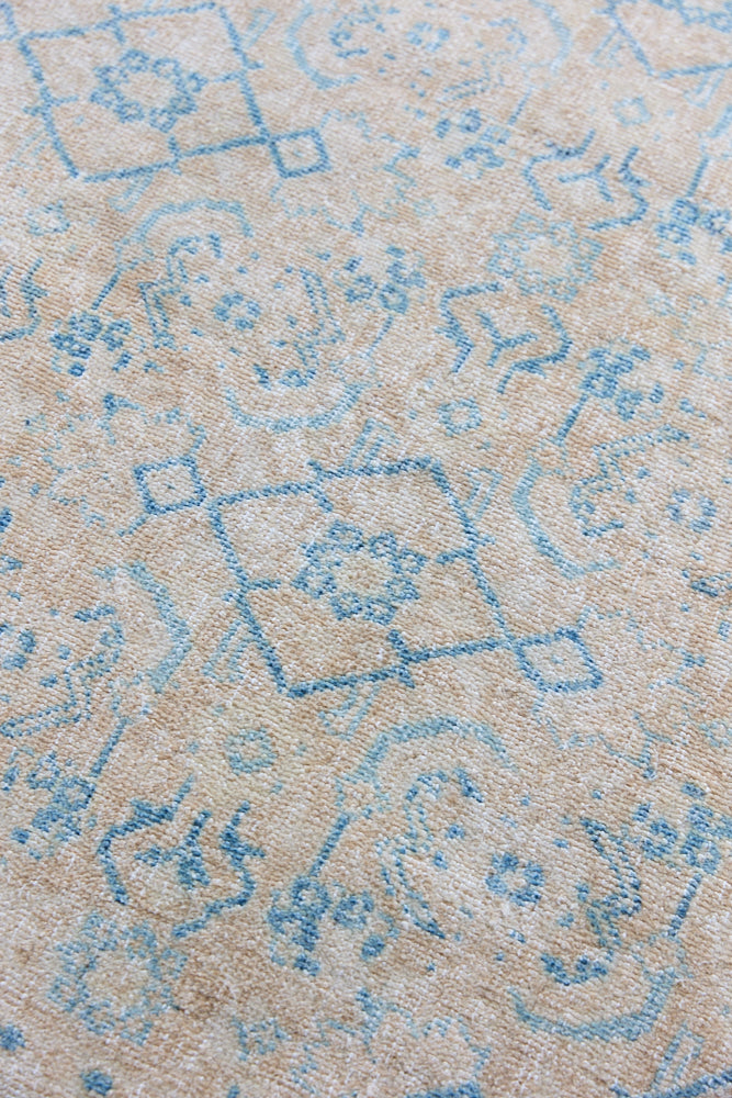 Annabelle is a beautiful Mahal rug featuring a peachy taupe field and a pretty, decorative all over floral design in blue