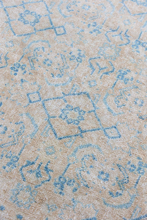Annabelle is a beautiful Mahal rug featuring a peachy taupe field and a pretty, decorative all over floral design in blue