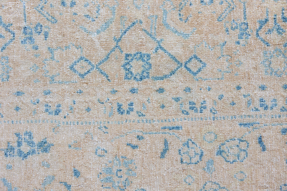 Annabelle is a beautiful Mahal rug featuring a peachy taupe field and a pretty, decorative all over floral design in blue