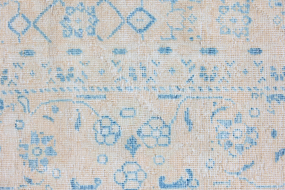 Annabelle is a beautiful Mahal rug featuring a peachy taupe field and a pretty, decorative all over floral design in blue