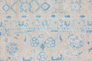 Annabelle is a beautiful Mahal rug featuring a peachy taupe field and a pretty, decorative all over floral design in blue
