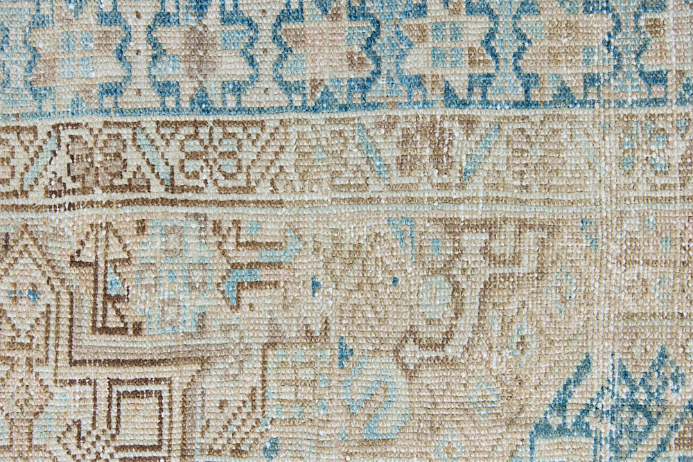 The Heriz is one of the most sought after and recognisable Persian designs, known for vibrant colours and bold geometric patterns. This runner features a beautiful colour palette of taupe, blue and muted brown.