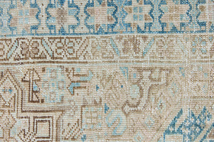 The Heriz is one of the most sought after and recognisable Persian designs, known for vibrant colours and bold geometric patterns. This runner features a beautiful colour palette of taupe, blue and muted brown.