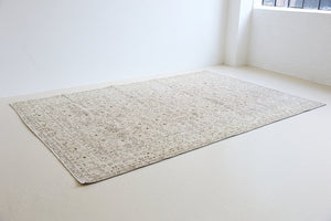 Josie is a vintage wool rug handwoven in Turkey approximately 80 years ago. The soft pink field and is decorated with an all floral scrolls pattern framed by a subtle contrasting taupe boarder.