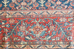 Farahan rugs are known for their high quality and are some of the most valuable Persian styles known for their repeating all over designs. Adeline is a large rug featuring a beautiful, intricate all over design on a dark blue ground with red boarder.