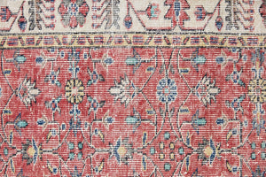 Glenda is a vintage wool rug handwoven in Turkey approximately 80 years ago. The warm terracotta field and is decorated with an all floral scrolls pattern framed by a contrasting taupe boarder.