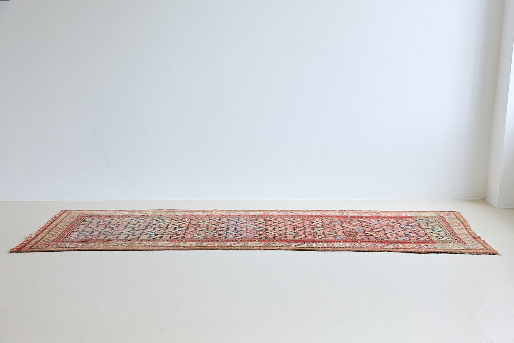 Inca is a handmade Persian Malayer runner woven in the North West of Iran. The Malayer region is known for producing some of the most ornate Persian rugs and runners, often known for their mesmerising and intricate repeating patterns. Inca features a beautiful abrash which adds depth and character.