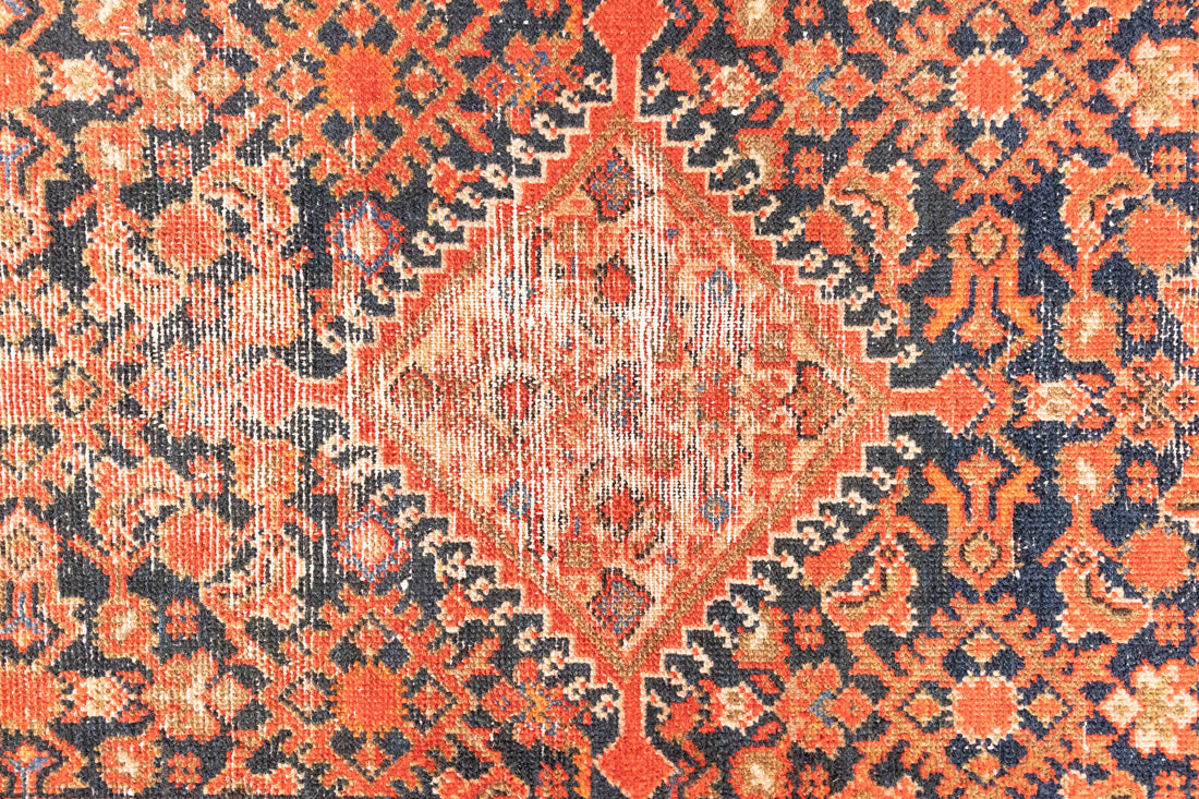 The Malayer region is known for producing some of the most ornate Persian carpets, often known for their mesmerising and intricate repeating patterns.This extra long handwoven vintage runner rug features a beautiful intricate design and lots of character and charm.