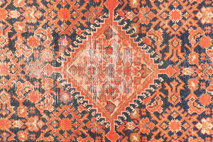 The Malayer region is known for producing some of the most ornate Persian carpets, often known for their mesmerising and intricate repeating patterns.This extra long handwoven vintage runner rug features a beautiful intricate design and lots of character and charm.