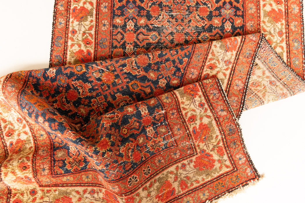The Malayer region is known for producing some of the most ornate Persian carpets, often known for their mesmerising and intricate repeating patterns.This extra long handwoven vintage runner rug features a beautiful intricate design and lots of character and charm.