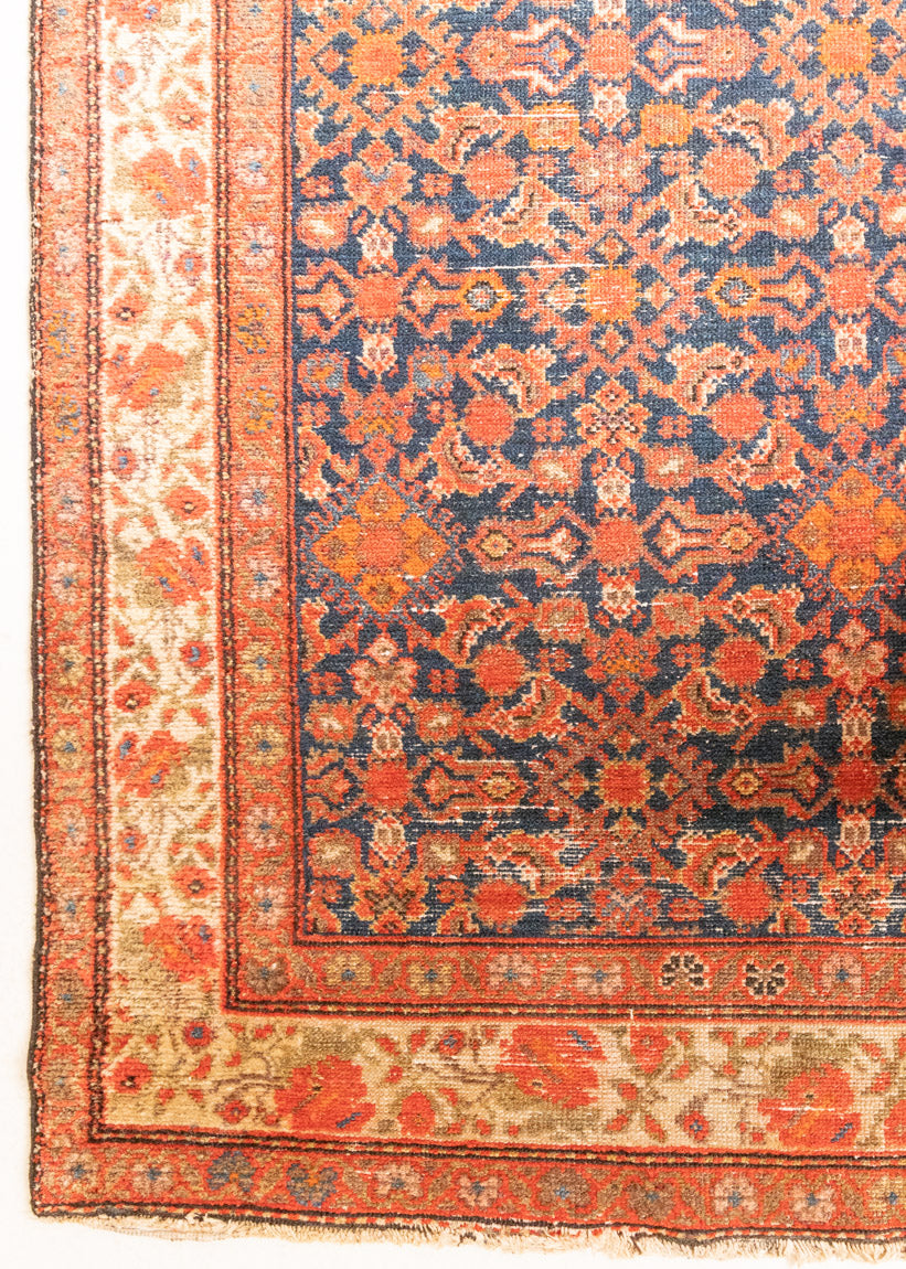 The Malayer region is known for producing some of the most ornate Persian carpets, often known for their mesmerising and intricate repeating patterns.This extra long handwoven vintage runner rug features a beautiful intricate design and lots of character and charm.