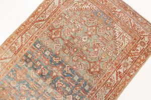 This is a Persian Malayer runner rug with a beautiful palette of blues and terracotta and a wonderful patina. Persia produces this finest carpets and this is one of them.