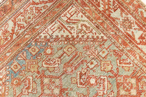 This is a Persian Malayer runner rug with a beautiful palette of blues and terracotta and a wonderful patina. Persia produces this finest carpets and this is one of them.