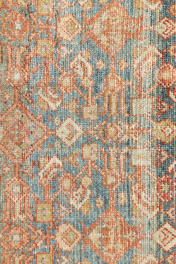 This is a Persian Malayer runner rug with a beautiful palette of blues and terracotta and a wonderful patina. Persia produces this finest carpets and this is one of them.