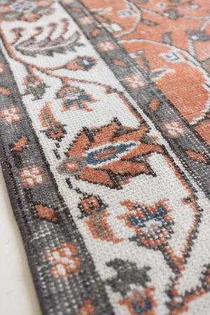 Introducing Amber, a handmade vintage Turkish rug. This beautiful vintage carpet features a beautiful rust colour palette and floral design.
