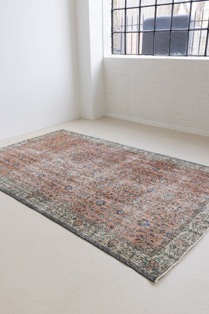 Ines is a vintage rug from Turkey, This gorgeous handwoven carpet features a lovely all over floral design and a soft colour palette. Shop our beautiful range of vintage rugs and carpets online now.