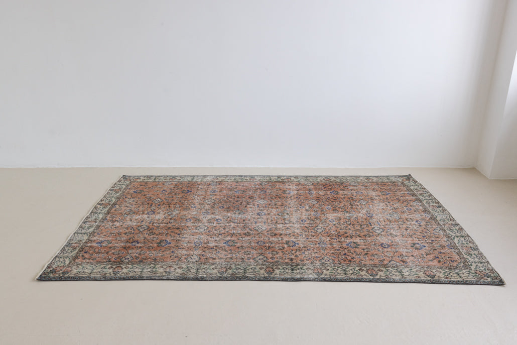 Ines is a vintage rug from Turkey, This gorgeous handwoven carpet features a lovely all over floral design and a soft colour palette. Shop our beautiful range of vintage rugs and carpets online now.