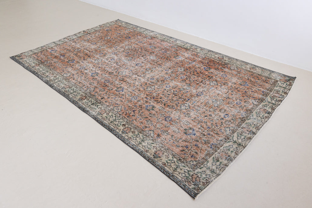Ines is a vintage rug from Turkey, This gorgeous handwoven carpet features a lovely all over floral design and a soft colour palette. Shop our beautiful range of vintage rugs and carpets online now.