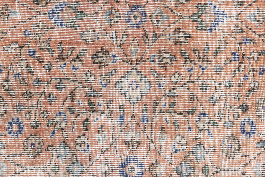 Ines is a vintage rug from Turkey, This gorgeous handwoven carpet features a lovely all over floral design and a soft colour palette. Shop our beautiful range of vintage rugs and carpets online now.