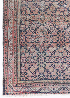 Eden is a muted pink antique Persian Malayer rug, handwoven in the North West of Iran. The Malayer region is known for ornate Persian carpets. 