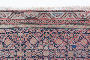 Eden is a muted pink antique Persian Malayer rug, handwoven in the North West of Iran. The Malayer region is known for ornate Persian carpets. 