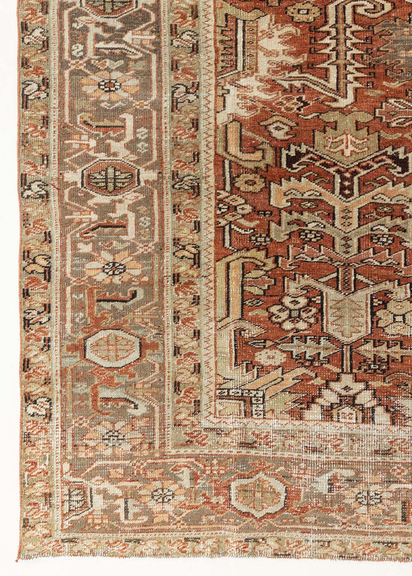 This is a antique Persian Heriz rug that has been over-dyed to gently fade its original colours, giving a more neutral palette. Persia has the most desirable rugs and carpets with stunning designs such as this carpet. Now available at Ourika London.