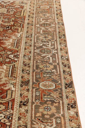 This is a antique Persian Heriz rug that has been over-dyed to gently fade its original colours, giving a more neutral palette. Persia has the most desirable rugs and carpets with stunning designs such as this carpet. Now available at Ourika London.