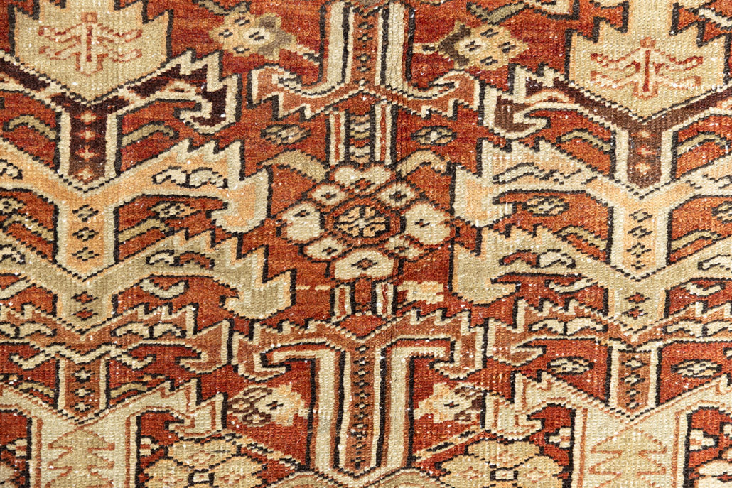 This is a antique Persian Heriz rug that has been over-dyed to gently fade its original colours, giving a more neutral palette. Persia has the most desirable rugs and carpets with stunning designs such as this carpet. Now available at Ourika London.