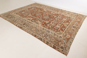 This is a antique Persian Heriz rug that has been over-dyed to gently fade its original colours, giving a more neutral palette. Persia has the most desirable rugs and carpets with stunning designs such as this carpet. Now available at Ourika London.