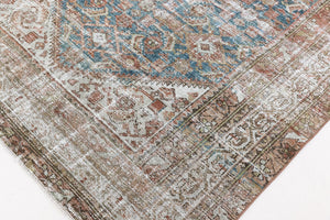 This is a antique Persian Malayer rug that has been over-dyed to gently fade its original colours, giving a more neutral palette. Persia has the most desirable rugs and carpets with stunning designs such as this carpet. Now available at Ourika London.