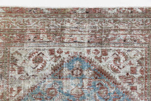 This is a antique Persian Malayer rug that has been over-dyed to gently fade its original colours, giving a more neutral palette. Persia has the most desirable rugs and carpets with stunning designs such as this carpet. Now available at Ourika London.