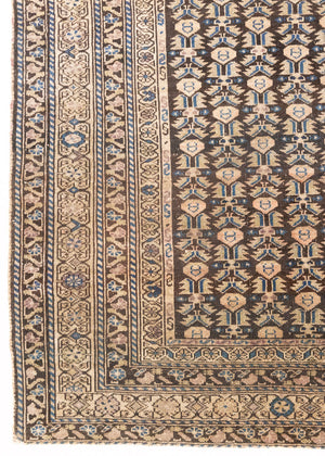 Liberty is a handmade Malayer rug, woven in the North West of Persia. This vintage carpet features a beautifully intricate repeating design and a rare colour palette.
