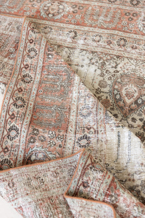 This is a handmade antique Tabriz rug woven in Persia. The Tabriz region is known for producing some of the most ornate Persian carpet, often known for their mesmerising and intricate repeating patterns.