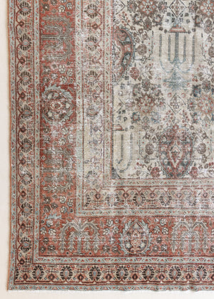 This is a handmade antique Tabriz rug woven in Persia. The Tabriz region is known for producing some of the most ornate Persian carpet, often known for their mesmerising and intricate repeating patterns.
