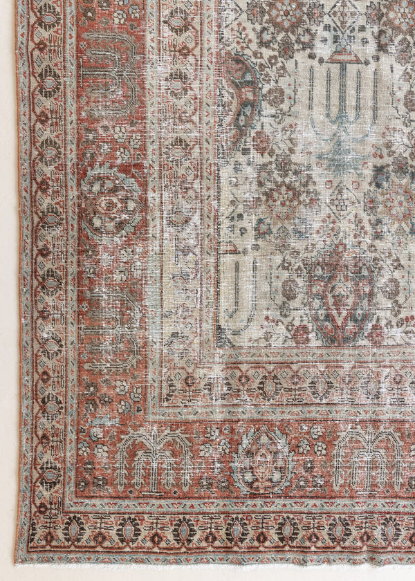 This is a handmade antique Tabriz rug woven in Persia. The Tabriz region is known for producing some of the most ornate Persian carpet, often known for their mesmerising and intricate repeating patterns.